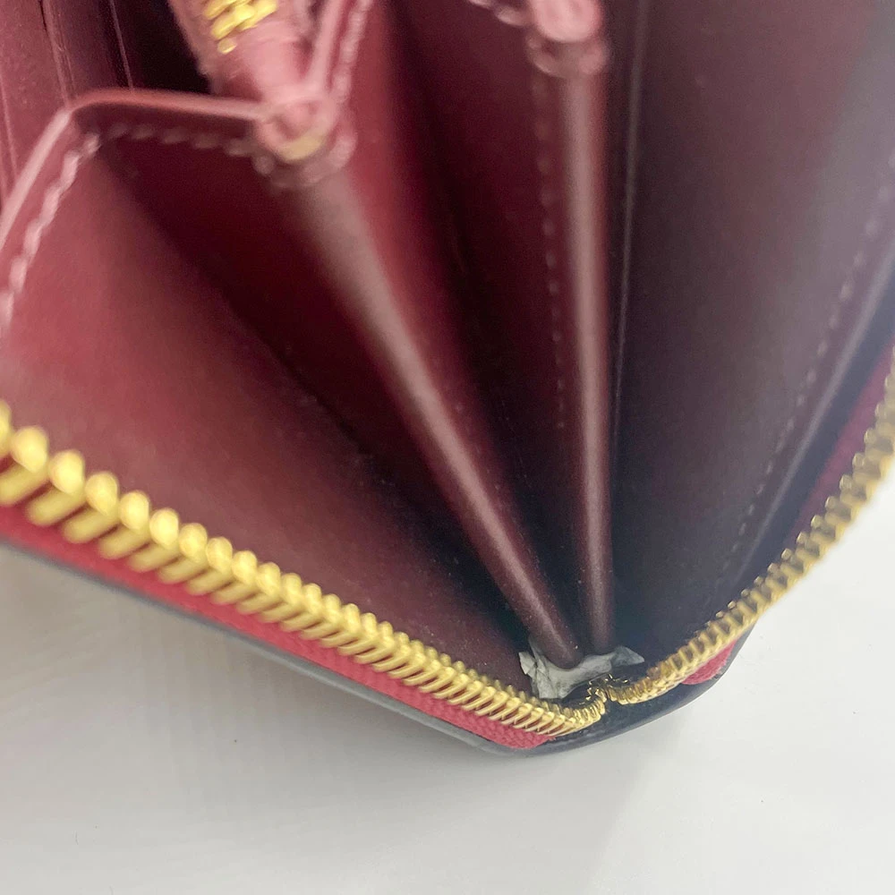 COACH財布ファスナースライダー詰まりの画像